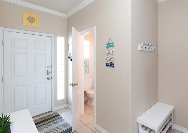 15102 Leeward Dr Unit 702, Corpus Christi, TX 78418 - foyer entrance with ornamental molding, light tile patterned floors, and baseboards