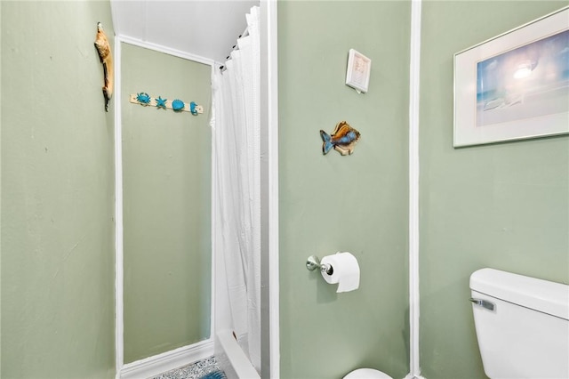 627 S Fuqua St, Rockport, TX 78382 - bathroom featuring toilet and a stall shower