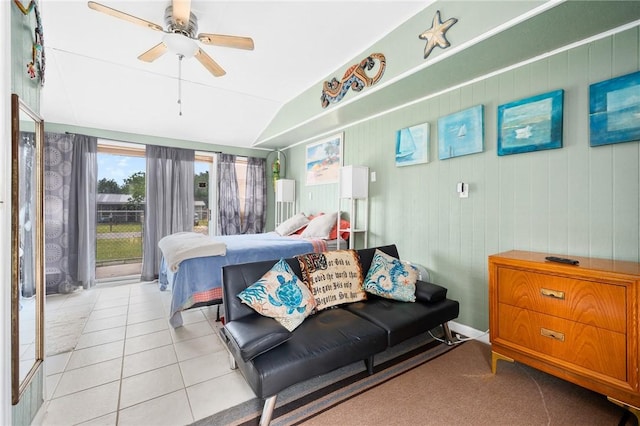 627 S Fuqua St, Rockport, TX 78382 - bedroom with lofted ceiling, light tile patterned flooring, and a ceiling fan