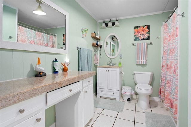 627 S Fuqua St, Rockport, TX 78382 - full bathroom with crown molding, vanity, tile patterned flooring, toilet, and a shower with curtain