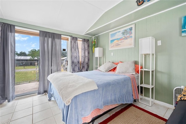 627 S Fuqua St, Rockport, TX 78382 - bedroom featuring tile patterned floors, access to outside, and vaulted ceiling