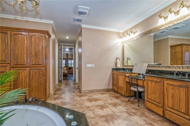 bathroom featuring a washtub, vanity, and ornamental molding