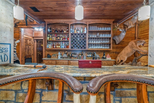 bar with wood ceiling