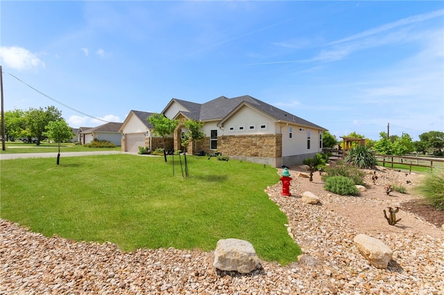 177 Glenvalley Cir, Bandera, TX 78003 - view of front of house with stone siding, a garage, stucco siding, fence, and a front yard