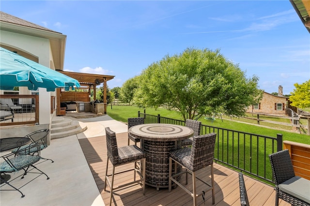 177 Glenvalley Cir, Bandera, TX 78003 - wooden deck with a yard and outdoor dining space