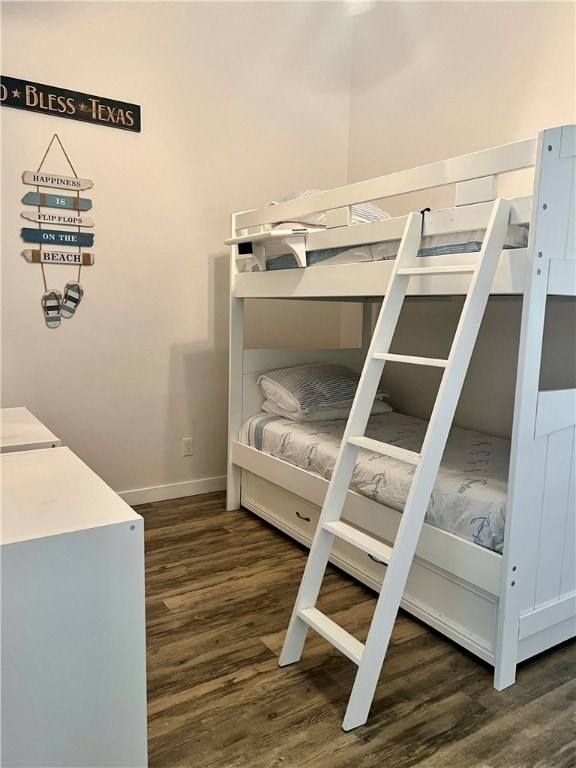 bedroom featuring dark hardwood / wood-style floors