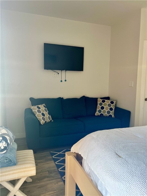 bedroom featuring dark hardwood / wood-style floors