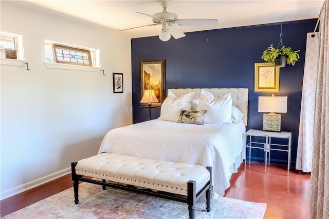 bedroom featuring ceiling fan and ornamental molding