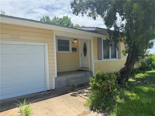 1222 Nancy St, Corpus Christi, TX 78412 - entrance to property with a garage and concrete driveway