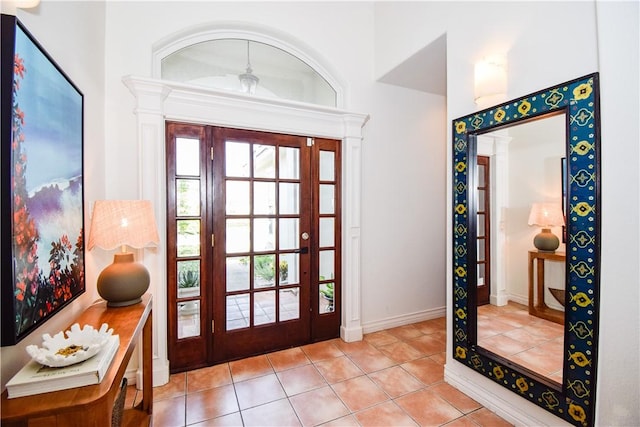 15854 El Soccorro, Corpus Christi, TX 78418 - entrance foyer featuring tile patterned flooring and baseboards