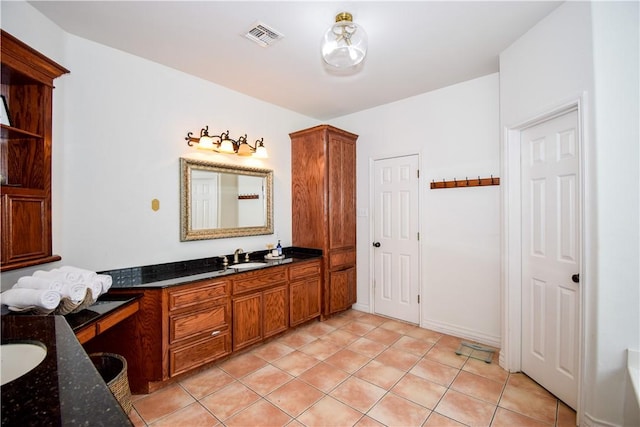 15854 El Soccorro, Corpus Christi, TX 78418 - bathroom featuring vanity and tile patterned flooring