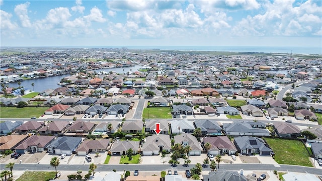 15854 El Soccorro, Corpus Christi, TX 78418 - aerial view of property's location featuring nearby suburban area and a nearby body of water