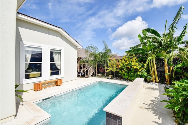 15854 El Soccorro, Corpus Christi, TX 78418 - outdoor pool featuring a patio and a fenced backyard