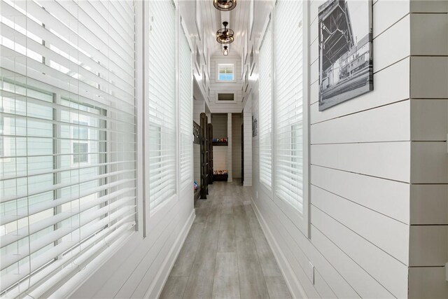hallway with light wood-type flooring