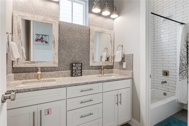 bathroom with double vanity, a sink, tile patterned flooring, and shower / tub combo with curtain