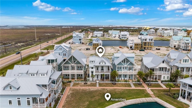 aerial view with a water view and a residential view