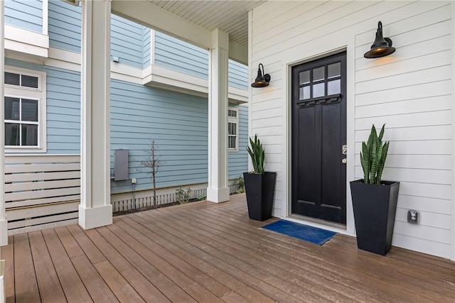 doorway to property featuring covered porch