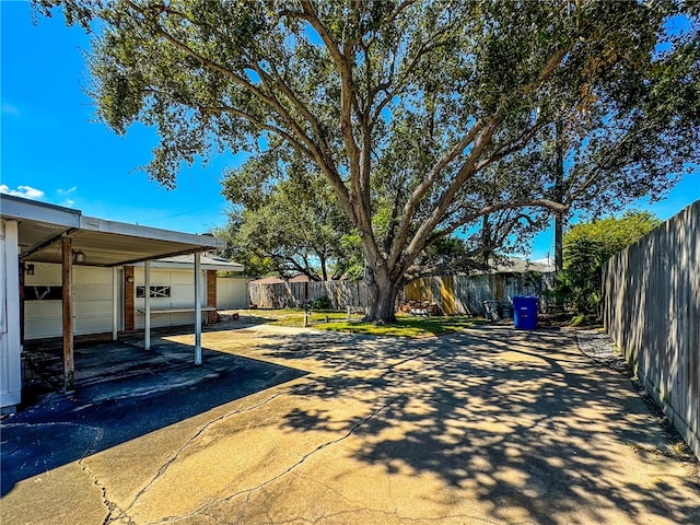 view of yard featuring a garage