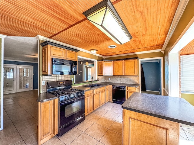 kitchen featuring decorative backsplash, black appliances, sink, and wood ceiling