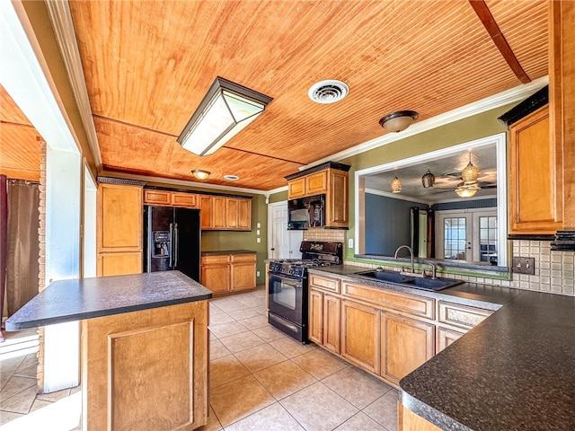 kitchen with black appliances, ornamental molding, a kitchen island, backsplash, and sink