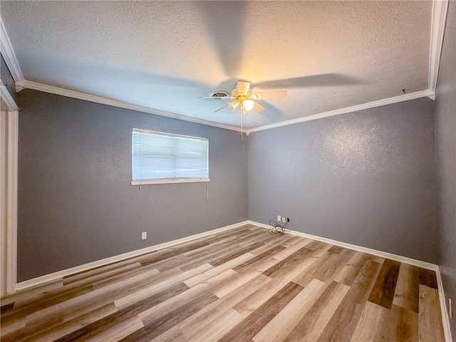 spare room featuring wood-type flooring, a textured ceiling, and ceiling fan