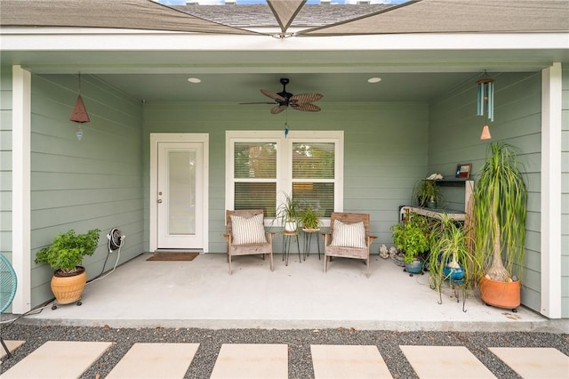 view of patio / terrace featuring ceiling fan