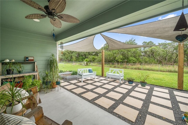 view of patio with ceiling fan