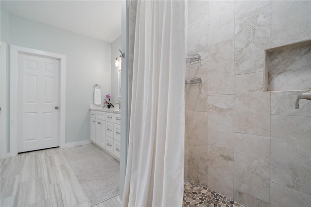 bathroom featuring vanity and walk in shower