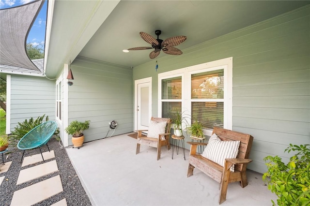 view of patio / terrace featuring ceiling fan