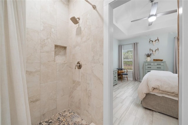 bathroom with curtained shower and ceiling fan