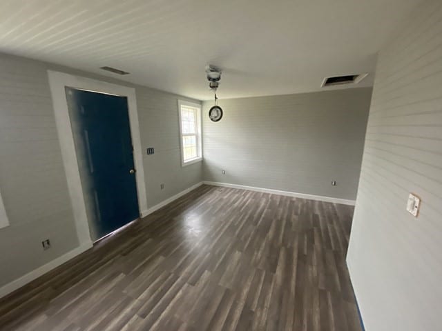 interior space featuring dark wood-type flooring