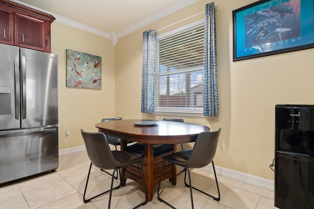 104 Sandollar Cir, Fulton, TX 78358 - dining area with ornamental molding and light tile patterned floors