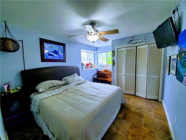 13938 Dasmarinas Dr, Corpus Christi, TX 78418 - bedroom with stone finish flooring, a closet, and a ceiling fan