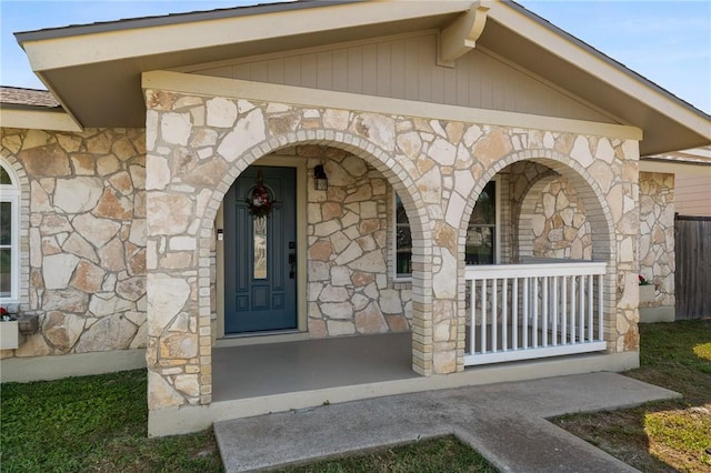 entrance to property with a porch