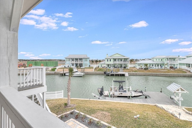 property view of water featuring a boat dock