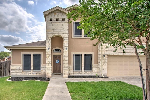 4522 Big Cyprus, Corpus Christi, TX 78410 - view of front of property with fence, a front lawn, stone siding, and stucco siding