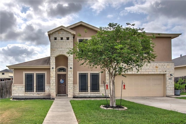 4522 Big Cyprus, Corpus Christi, TX 78410 - view of front of home featuring fence, stucco siding, a front yard, and stone siding