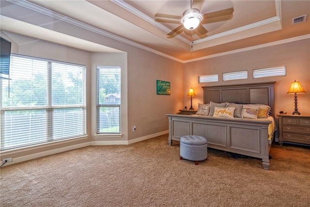 4522 Big Cyprus, Corpus Christi, TX 78410 - carpeted bedroom featuring visible vents, ornamental molding, baseboards, ceiling fan, and a tray ceiling