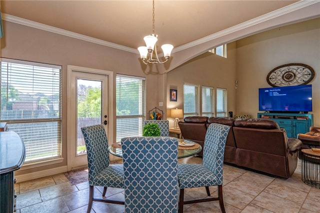 4522 Big Cyprus, Corpus Christi, TX 78410 - dining room with crown molding, arched walkways, a chandelier, and a healthy amount of sunlight
