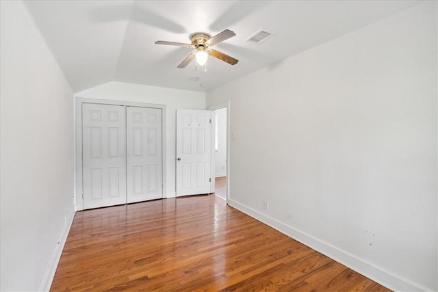 330 Ohio Ave, Corpus Christi, TX 78404 - unfurnished bedroom featuring light wood-style floors, a closet, a ceiling fan, and lofted ceiling