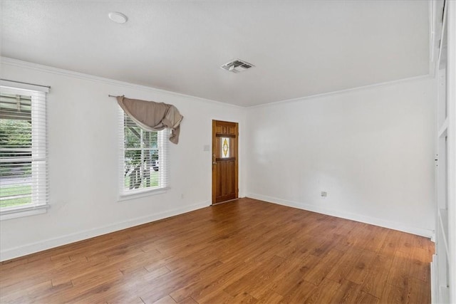 330 Ohio Ave, Corpus Christi, TX 78404 - empty room with ornamental molding and wood finished floors