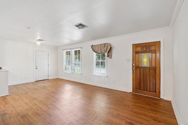 330 Ohio Ave, Corpus Christi, TX 78404 - entrance foyer with light wood-style floors and crown molding