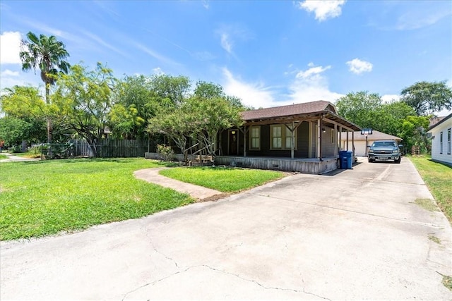 330 Ohio Ave, Corpus Christi, TX 78404 - view of front of home with a front yard, a porch, and driveway