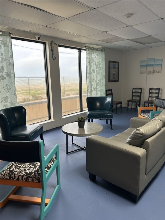 3938 Surfside Blvd Unit 1121, Corpus Christi, TX 78402 - living room featuring finished concrete floors and a paneled ceiling