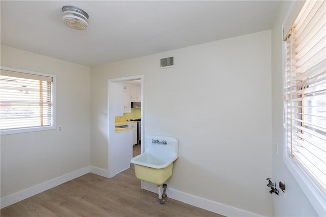 washroom featuring light hardwood / wood-style flooring