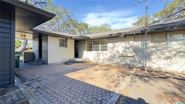 exterior space with a patio area