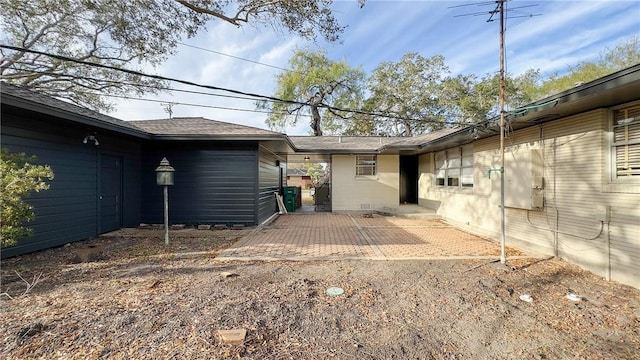 rear view of property with a patio area