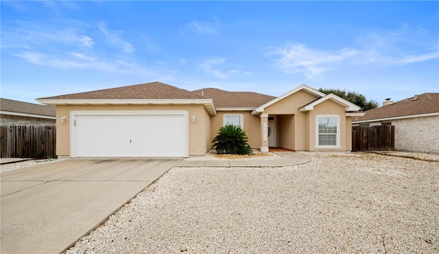 single story home with a garage