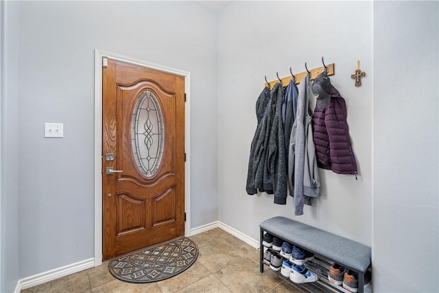 foyer featuring light tile patterned floors