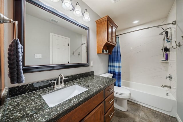 full bathroom with shower / tub combo with curtain, vanity, and toilet